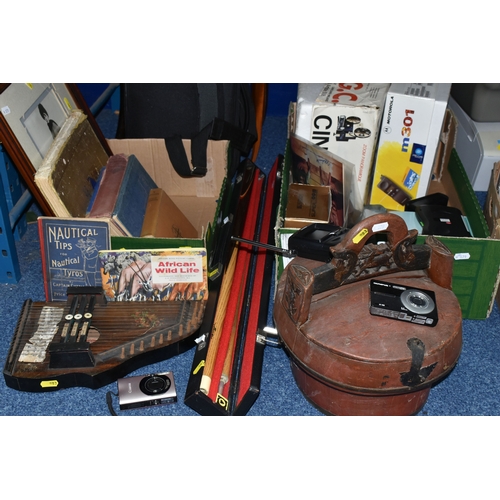 583 - TWO BOXES OF MISCELLANEOUS SUNDRIES, to include a B.C.E 'Alex Higgins' snooker cue with hard case, a... 