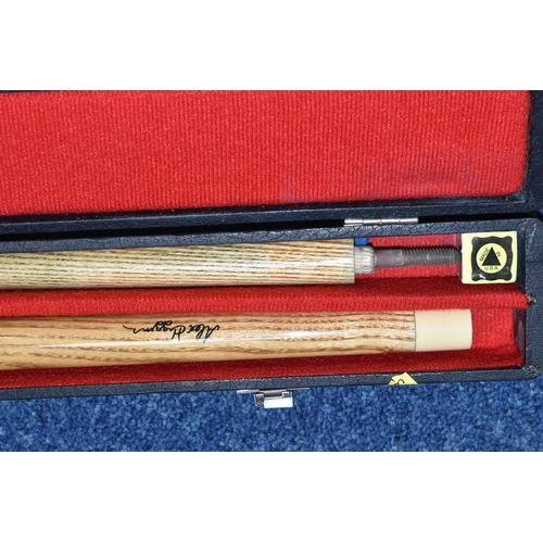 583 - TWO BOXES OF MISCELLANEOUS SUNDRIES, to include a B.C.E 'Alex Higgins' snooker cue with hard case, a... 