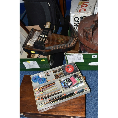 583 - TWO BOXES OF MISCELLANEOUS SUNDRIES, to include a B.C.E 'Alex Higgins' snooker cue with hard case, a... 