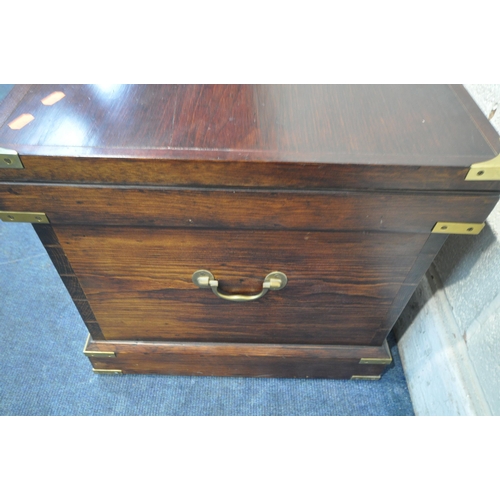 1202 - A STAINED PINE CAMPAIGN BLANKET BOX, with a hinged lid, twin brass handles and banding, width 95cm x... 