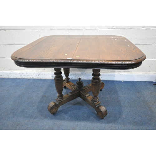 1208 - A FRENCH STYLE OAK EXTENDING DINING TABLE, with two additional leaves, raised on four turned legs, u... 