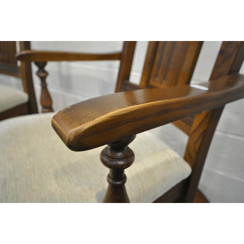 1208 - A FRENCH STYLE OAK EXTENDING DINING TABLE, with two additional leaves, raised on four turned legs, u... 