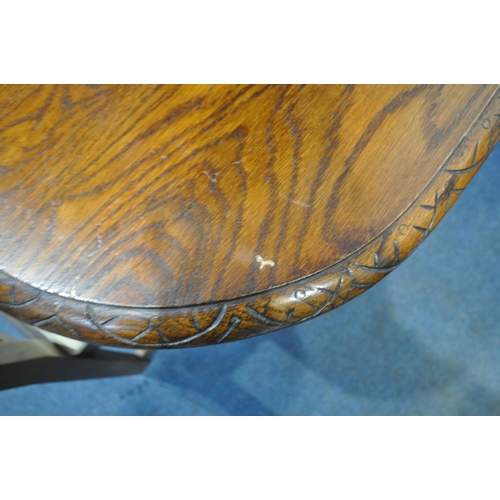 1208 - A FRENCH STYLE OAK EXTENDING DINING TABLE, with two additional leaves, raised on four turned legs, u... 