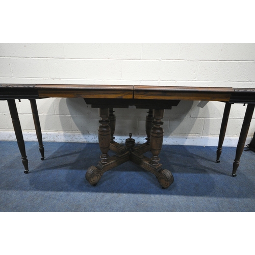 1208 - A FRENCH STYLE OAK EXTENDING DINING TABLE, with two additional leaves, raised on four turned legs, u... 