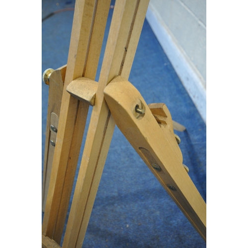 1209 - TWO BEECH FRAMED FOLDING ARTISTS EASELS (condition report: one easel missing tightening nut, both wi... 