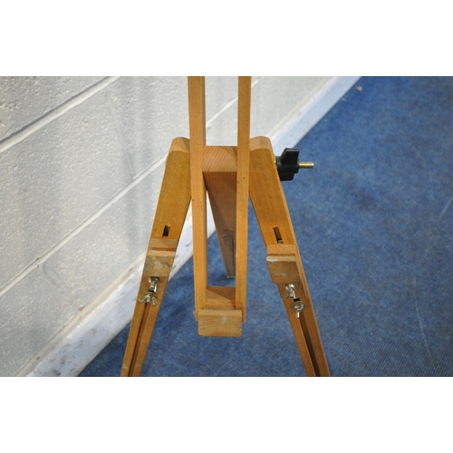 1209 - TWO BEECH FRAMED FOLDING ARTISTS EASELS (condition report: one easel missing tightening nut, both wi... 