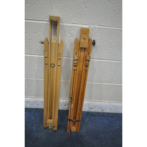 1209 - TWO BEECH FRAMED FOLDING ARTISTS EASELS (condition report: one easel missing tightening nut, both wi... 