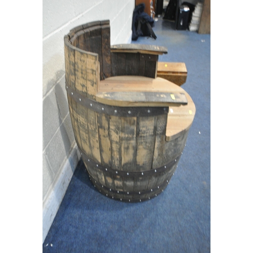 1211 - A BESPOKE ARMCHAIR ADAPTED FROM AN OAK COOPERED BARREL, with metal banding, approximate diameter 62c... 