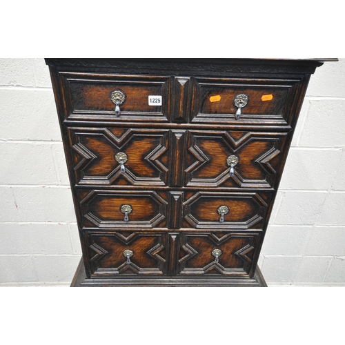 1225 - AN EARLY 20TH CENTURY JACOBEAN STYLE CHEST ON STAND, fitted with five drawers with various geometric... 