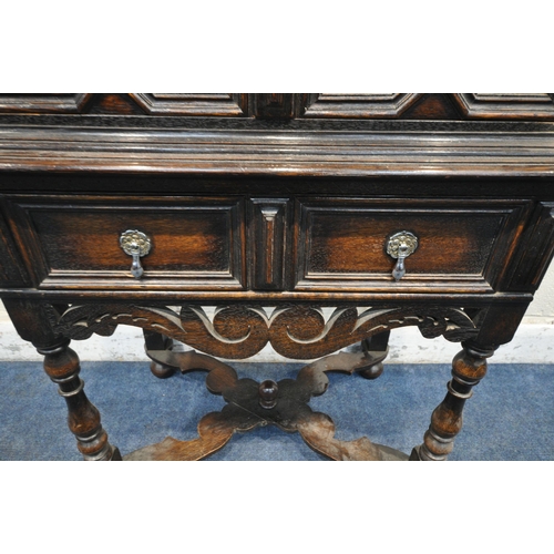 1225 - AN EARLY 20TH CENTURY JACOBEAN STYLE CHEST ON STAND, fitted with five drawers with various geometric... 