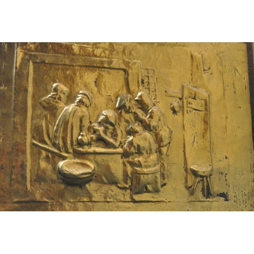 1227 - A 20TH CENTURY LOG BOX, the pressed brass depicting a variety of people, horses and buildings, with ... 