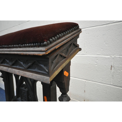 1232 - A 19TH CENTURY OAK CHURCH PRAYER KNEELER, with burgundy upholstered elbow rest and kneeling platform... 