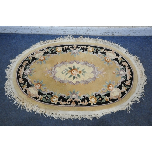 1239 - A YELLOW GROUND CHINESE WOOLEN RUG, with floral medallion and border, 163cm x 103cm (condition repor... 