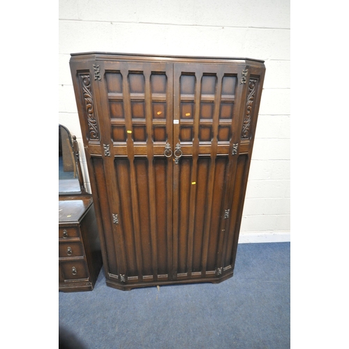 1246 - A 20TH CENTURY OAK TWO PIECE BEDROOM SUITE, comprising a  double door wardrobe, width 123cm x depth ... 