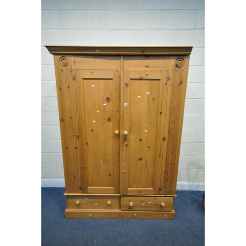 1251 - A 20TH CENTURY PINE DOUBLE DOOR WARDROBE, with two drawers, width 145cm x depth 56cm x height 203cm ... 