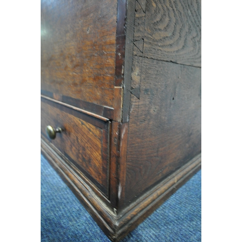 1253 - A SMALL GEORGIAN AND LATER OAK AND INLAID MULE CHEST, the inner lid depicting a carved coat of arms,... 