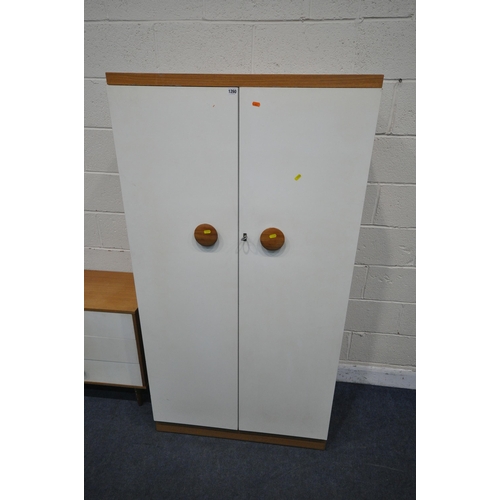 1260 - A THREE PIECE BEDROOM SUITE, comprising a double door wardrobe, width 91cm x depth 51cm x height 173... 