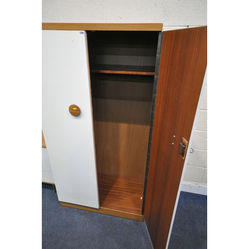 1260 - A THREE PIECE BEDROOM SUITE, comprising a double door wardrobe, width 91cm x depth 51cm x height 173... 