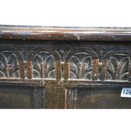 1268 - A GEORGIAN OAK COFFER, with a hinged lid, and lunette carved frieze, width 120cm x depth 57cm x heig... 