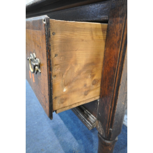 1272 - A GEORGIAN OAK DRESSER BASE, with three deep drawers, on cylindrical tapered legs and padded feet, l... 