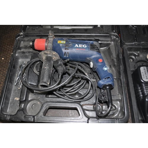 1059 - AN AEG SBE630RX 240V DRILL in case and a Hitachi DV18CL2 cordless drill with case, two batteries and... 