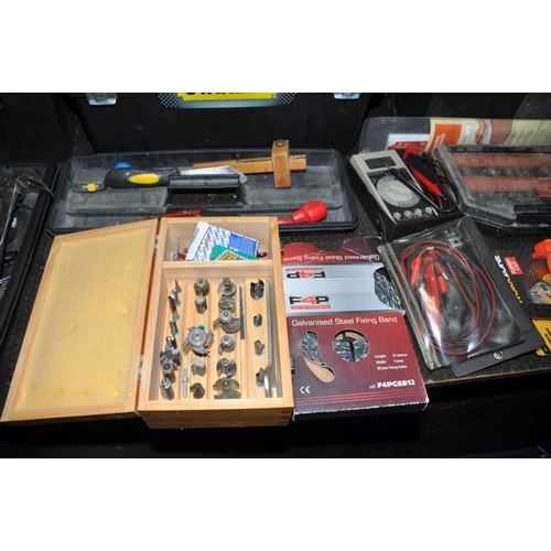 1064 - THREE TOOLBOXES INCLUDING TOOLS including a Mitoyu combination square, two router bit sets, a Stanle... 