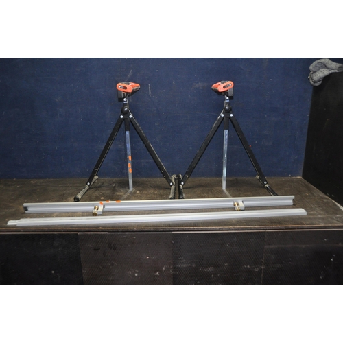 1068 - A PAIR OF ROLLER STANDS and a carpenters straight edge guide with two clamps 286cm long in total and... 