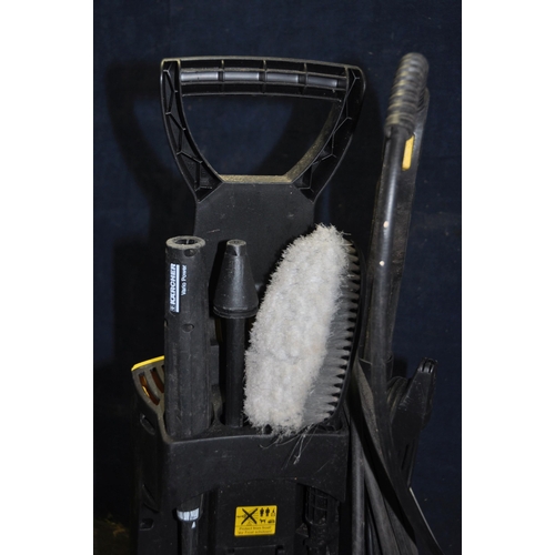 1073 - A KARCHER K3.99 PRESSURE WASHER with lance and three accessories (untested due to round 16a plug)