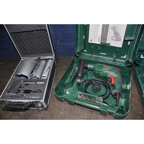 1086 - A CASED BOSCH PBH2100RE DRILL, a cased Bosch PSB680RE drill, a Silverline angle grinder (all PAT pas... 