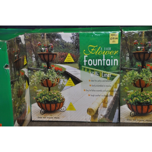 1098 - FOUR BOXED WILKINSON 3 TIER FLOWER FOUNTAINS with liners
