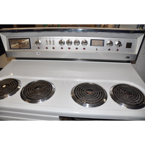 1103 - A VINTAGE G.E.C. ELECTRIC RANGE COOKER with four top rings, two oven, one grill and drawer width 107... 