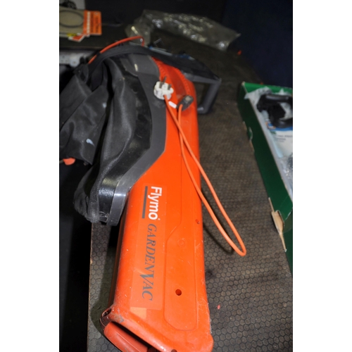 1111 - A GARDENLINE ELECTRIC POLE HEDGE TRIMMER (still packaged and new) and a Flymo garden vac (untested)