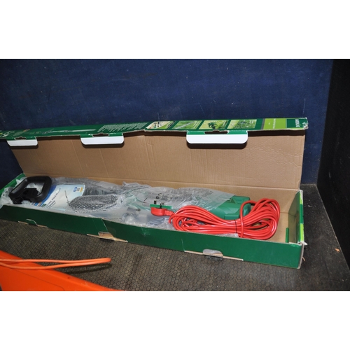 1111 - A GARDENLINE ELECTRIC POLE HEDGE TRIMMER (still packaged and new) and a Flymo garden vac (untested)