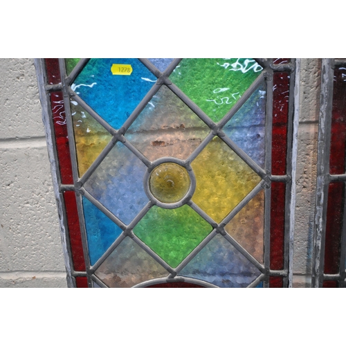 1278 - AN OPPOSING PAIR OF LEAD GLAZED WINDOWS, with red border, surrounding  multi-coloured panes, with a ... 