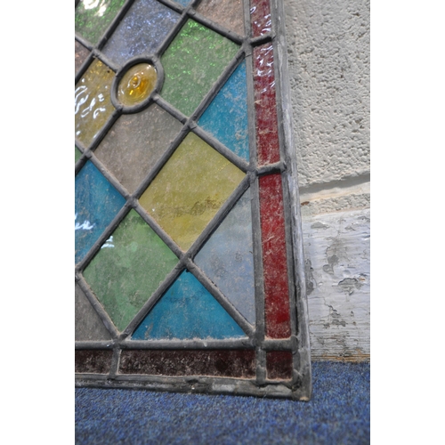 1278 - AN OPPOSING PAIR OF LEAD GLAZED WINDOWS, with red border, surrounding  multi-coloured panes, with a ... 