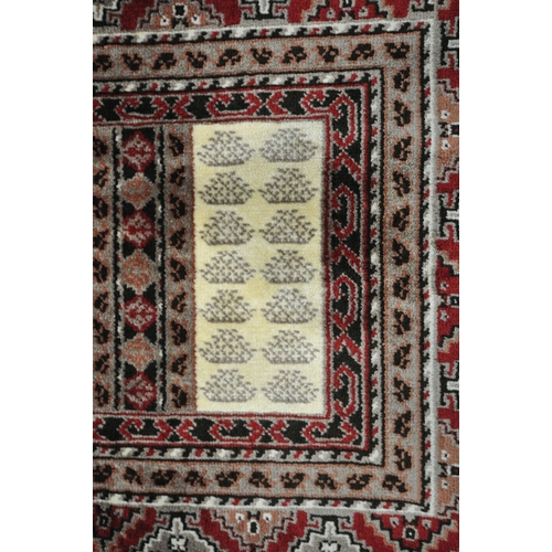 1284 - A SMALL RECTANGULAR ISPHAHAN SILK RUG, with a variety of repeating geometric patterns, 105cm x 73cm ... 