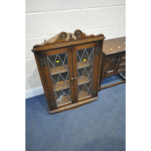 1298 - AN OLD CHARM OAK OVERMANTEL MIRROR, with twin finials flanking carved foliate detail, turned support... 