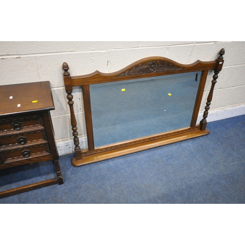 1298 - AN OLD CHARM OAK OVERMANTEL MIRROR, with twin finials flanking carved foliate detail, turned support... 