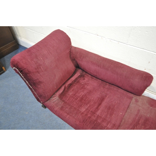 1300 - A 20TH CENTURY CHAISE LOUNGE, with burgundy studded upholstery, length 161cm x depth 65cm x height 6... 