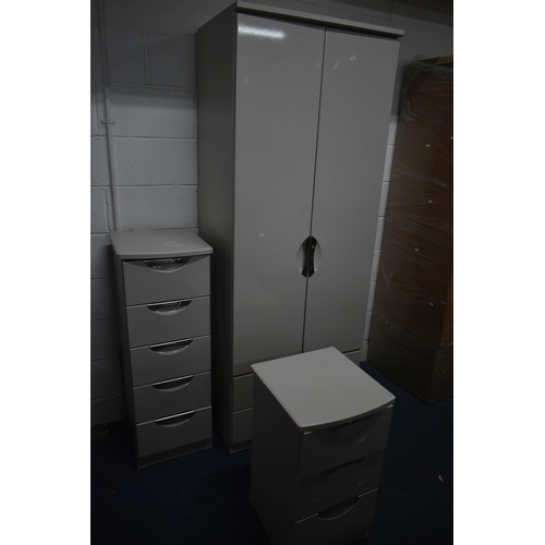 1308 - A MODERN LIGHT GREY FINISH FOUR PIECE BEDROOM SUITE, comprising a double door wardrobe, with two dra... 