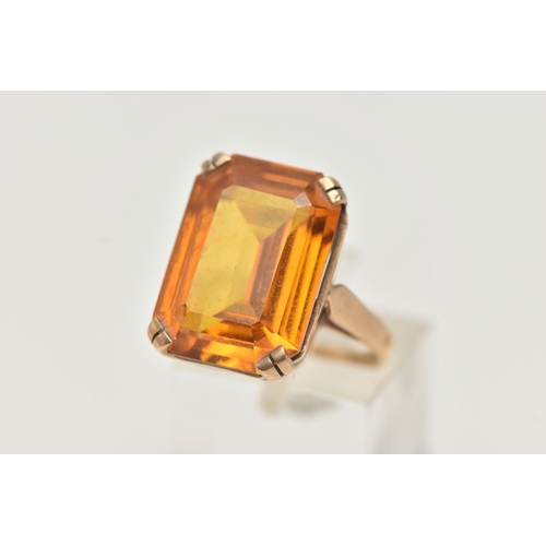 101 - A 9CT GOLD DRESS RING, a rectangular cut citrine, approximate length 18mm x width 13mm, prong set in... 