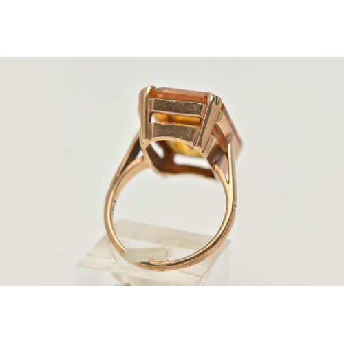 101 - A 9CT GOLD DRESS RING, a rectangular cut citrine, approximate length 18mm x width 13mm, prong set in... 