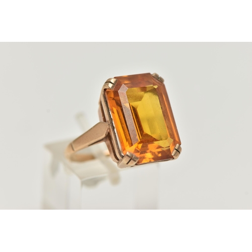 101 - A 9CT GOLD DRESS RING, a rectangular cut citrine, approximate length 18mm x width 13mm, prong set in... 