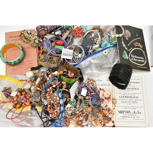 135 - TWO BAGS OF ASSORTED COSTUME JEWELLERY WITH BOOKS, to include a mid 20th century, glass bird necklac... 