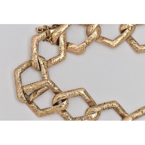 2 - AN EARLY 20TH CENTURY YELLOW METAL BRACELET, a fancy link chain bracelet with etched detail, fitted ... 