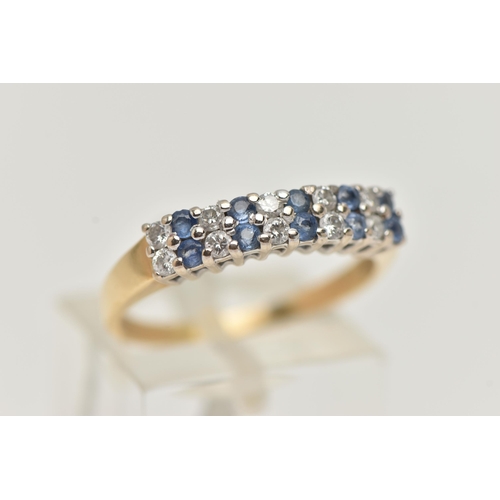 37 - A GEM SET RING, a double row of round brilliant cut diamonds and round cut blue sapphire, prong set ... 