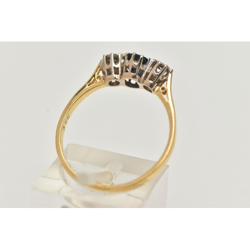 41 - AN 18CT GOLD THREE STONE RING, a principally set oval cut sapphire, with two round brilliant cut dia... 
