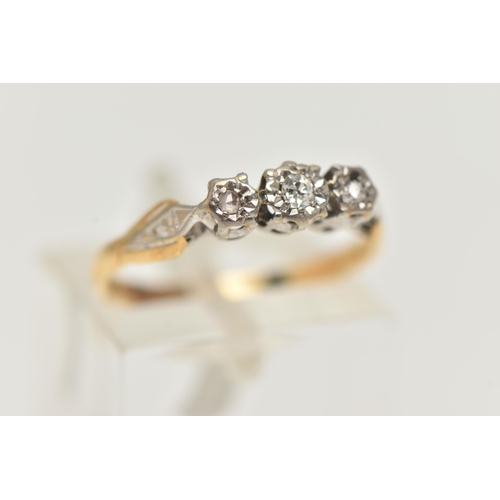 42 - A THREE STONE DIAMOND RING, an old cut diamond with two rose cut diamonds, set in a white metal illu... 