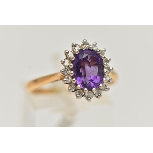 44 - AN AMETHYST AND DIAMOND DRESS RING, an oval cut amethyst prong set in white gold, set with a surroun... 