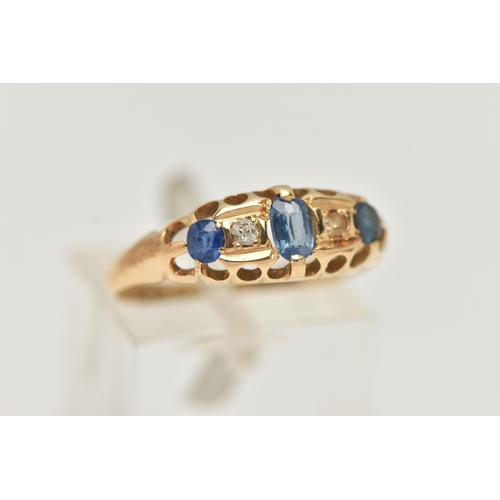 47 - AN EARLY 20TH CENTURY SAPPHIRE AND DIAMOND RING, a principally set oval cut sapphire, set with two r... 